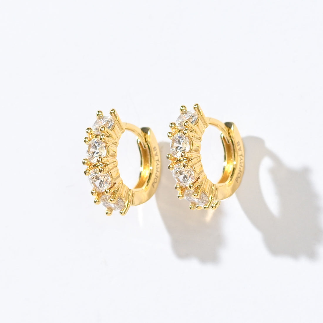 Kaia Mini Huggies | Clear Gold