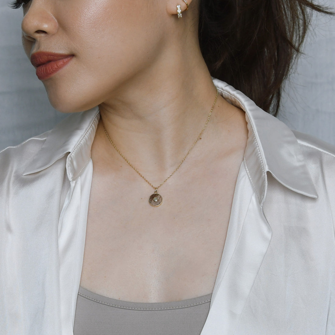 Theia Coin 6.5 carat Rutilated Quartz with White Topaz (S925)