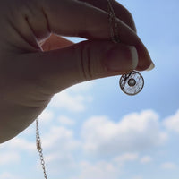 Theia Coin 6.5 carat Rutilated Quartz with White Topaz (S925)